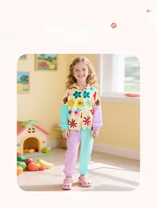 Detail of girls floral hoodie set with colorful flower print and contrast sleeves