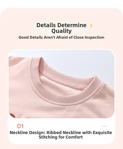 Detail of pink cotton fleece sweatshirt showing ribbed neckline and fine inner stitching
