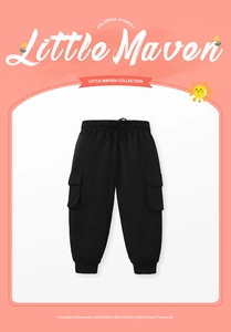 Detail of kids black cotton cargo joggers featuring drawstring waist and side flap pockets