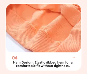 Detail view of orange knit sweatshirt with elastic ribbed hem for girls outfit