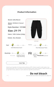 Close-up of black 100% cotton boys cargo pants with soft texture and elastic cuffs
