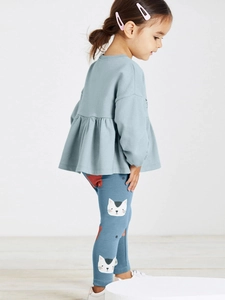 Girls long sleeve ruffle hem light blue top and navy cat print leggings outfit set
