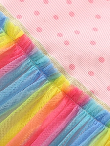 Abito da bambina a maniche lunghe con gonna in tulle arcobaleno e corpetto a pois rossi