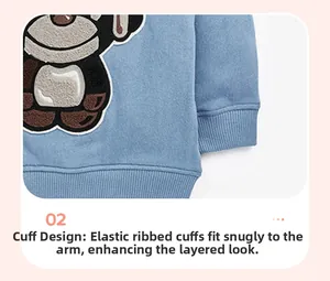 Close-up of baby sweatshirt featuring cute bear embroidery and elastic ribbed cuffs
