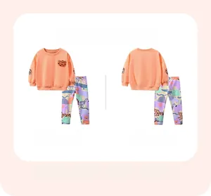 Front and back view of girls fleece tracksuit with leopard embroidery and animal print
