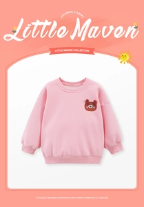 Detail of pink cotton girl sweatshirt featuring brown bear embroidery and ribbed cuffs