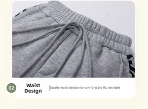 Detail of grey winter toddler joggers showing elastic waistband and drawstring texture