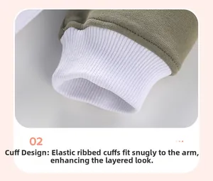 Close-up of elastic ribbed green and white stitching cuffs on children cotton sweatshirt