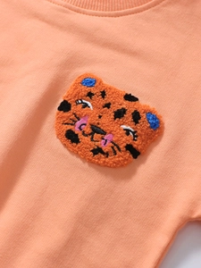 Peach orange girl's sweatshirt featuring a 3D textured tiger towel embroidery detail
