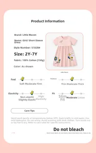 Detail of pink cotton girl's dress with rabbit patterns and size chart specifications