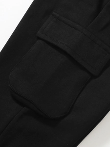 Boys black cotton cargo pants with functional side flap pocket and reinforced stitching