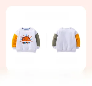 Flat lay view of kids sweatshirt with sun print, colorful sleeves and happy lettering