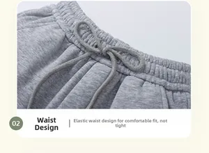 Detail of grey kids joggers showing elastic waist with adjustable drawstring texture