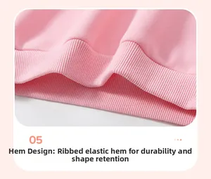 Detail of pink sweatshirt ribbed hem featuring elastic knit texture and soft fabric finish