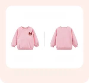 Flat lay of pink girls sweatshirt with bear embroidery showing front and back views