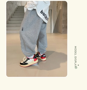 Gray fleece lined kids joggers with elastic cuffs and a comfortable relaxed fit