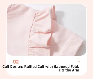 Dettaglio del vestito in cotone rosa con maniche a volant e cuciture rifinite