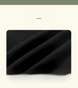 Close-up of soft black fleece fabric detail for warm and breathable children's winter pants