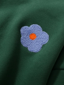 Girl's dark green fleece sweatshirt featuring 3D chenille flower embroidery detail