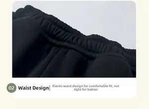Detail of baby pants featuring a stretchy elastic waistband for a comfortable fit
