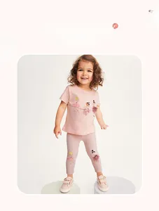 Detail view of girls pink summer set with 3D mesh tutu ballerina applique on top and pants