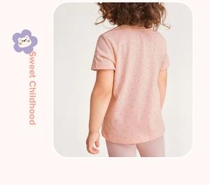 Close-up of pink girls cotton t-shirt and pants set with dark polka dot print patterns