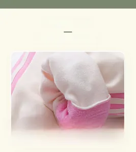 Detail of pink fleece lining showing thick, warm lamb wool texture for kids winter pants