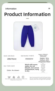 Close-up of boys thick thermal pants with side embossed STRANDED letters in navy blue