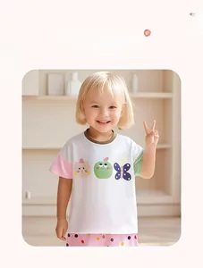 Detail of girl cotton summer set with cat print t-shirt and pink polka dot shorts