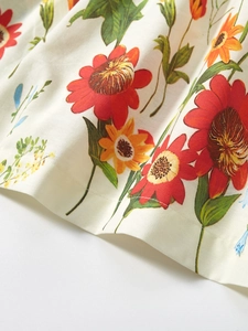 Cotton floral short sleeve dress for girls with ruffle neck and vibrant red flower print