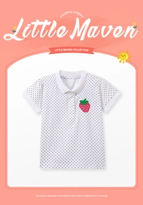 Close-up of girls' cotton polo shirt featuring red strawberry embroidery and star print