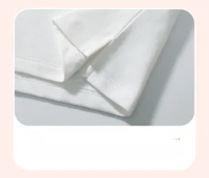 Detail view of cotton t-shirt with side split hem and double-needle stitching quality