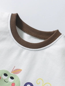 White cotton t-shirt for girls featuring a brown ribbed collar and apple graphic print