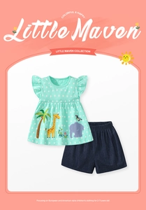 Detail of girl's cotton tee with animal embroidery and denim shorts summer set