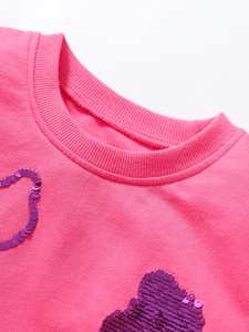 Sweatshirt rose fuchsia pour fille avec cœur en paillettes mauves et col rond côtelé
