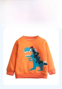 Front detail of orange cotton kids sweatshirt with a large blue dinosaur print