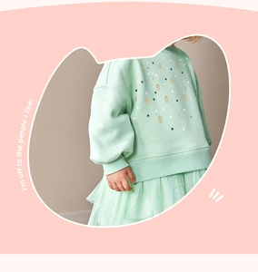 Détail de la robe tutu pour fille vert menthe avec sweat à fleurs et jupe en tulle