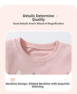 Detail view of the pink knit rib neckline with high-quality double-needle stitching