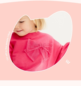 Detail of pink girls' sweatshirt featuring a multi-layered mesh bow and ribbed crew neck