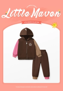 Detailed view of kids zip-up hoodie set with contrast sleeves and white star pattern