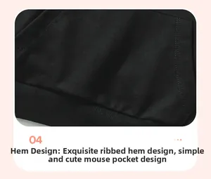 Detail view of boys black hoodie featuring a ribbed hem and classic kangaroo pocket
