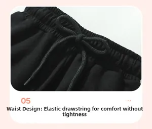 Close-up of boys' black jogger waist with elastic band and adjustable drawstring
