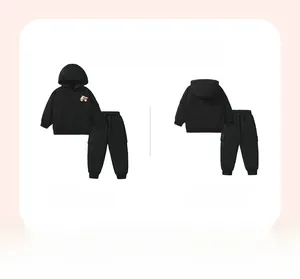 Front and back view of boys' black hooded sweatshirt set with yellow truck embroidery