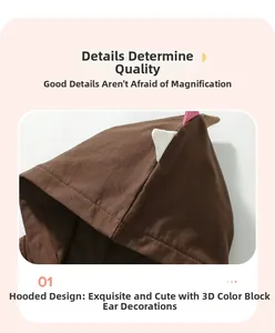 Detail of brown knit kids hoodie featuring cute pink and white 3D animal ears on top