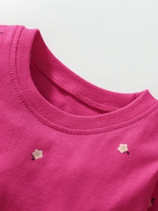 Vestido de princesa para niña en algodón magenta con estampados florales blancos