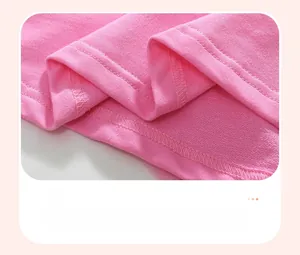 Detail view of pink cotton dress hem featuring high-quality double-needle stitching