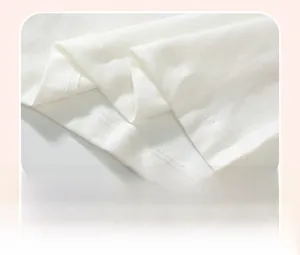 Close-up of white cotton T-shirt hem with professional double-needle stitching detail