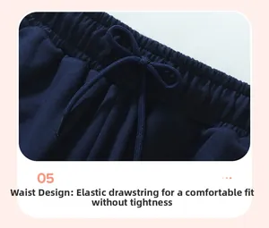 Close-up of boys' navy blue trousers featuring elastic waistband and functional drawstring