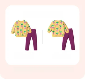 Front and back detail of toddler girl sweatshirt set with cartoon vegetable patterns