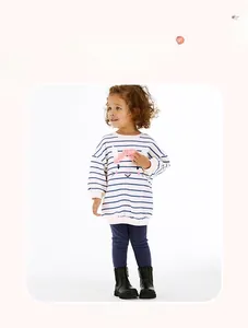 Detail of girls' cotton leggings paired with a striped cartoon rabbit sweatshirt set